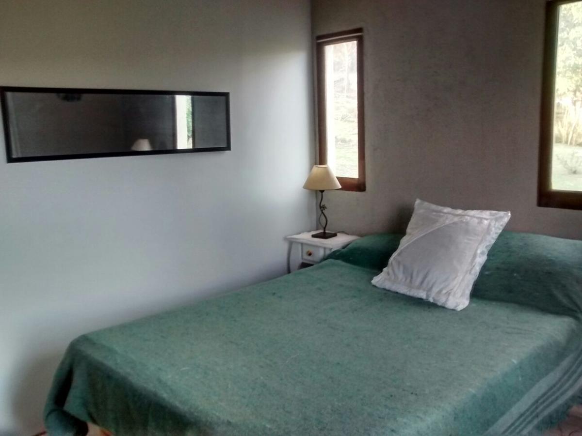 Las Acacias Refugio De Descanso La Falda Bagian luar foto